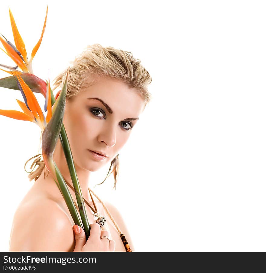 blond woman with strelizia flowers isolated on white background. blond woman with strelizia flowers isolated on white background