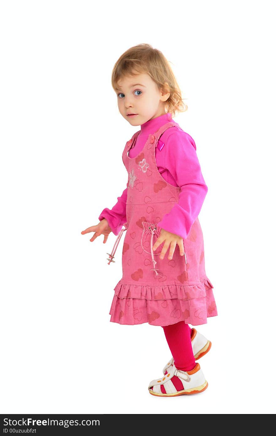 Little girl in pink dress on white