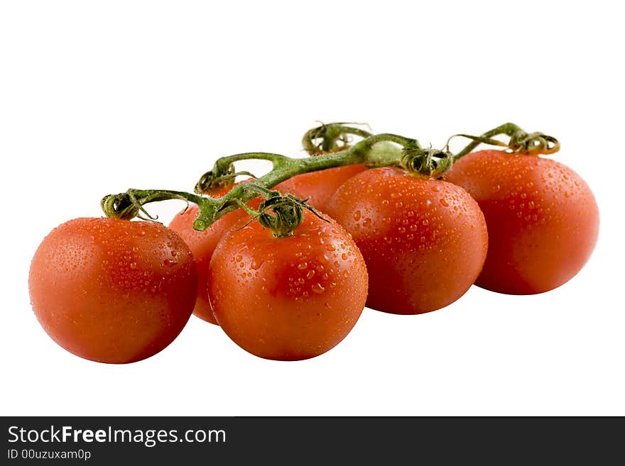 Six fresh tomatos isolated on white background