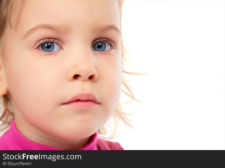 Little girl in pink dress close-up