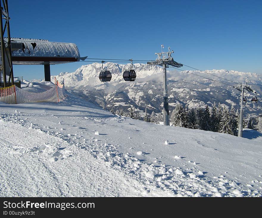 Gondola lift station in mountain of Austrian alps