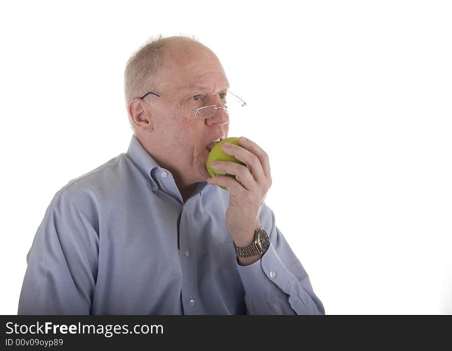 Man Eating Green Apple