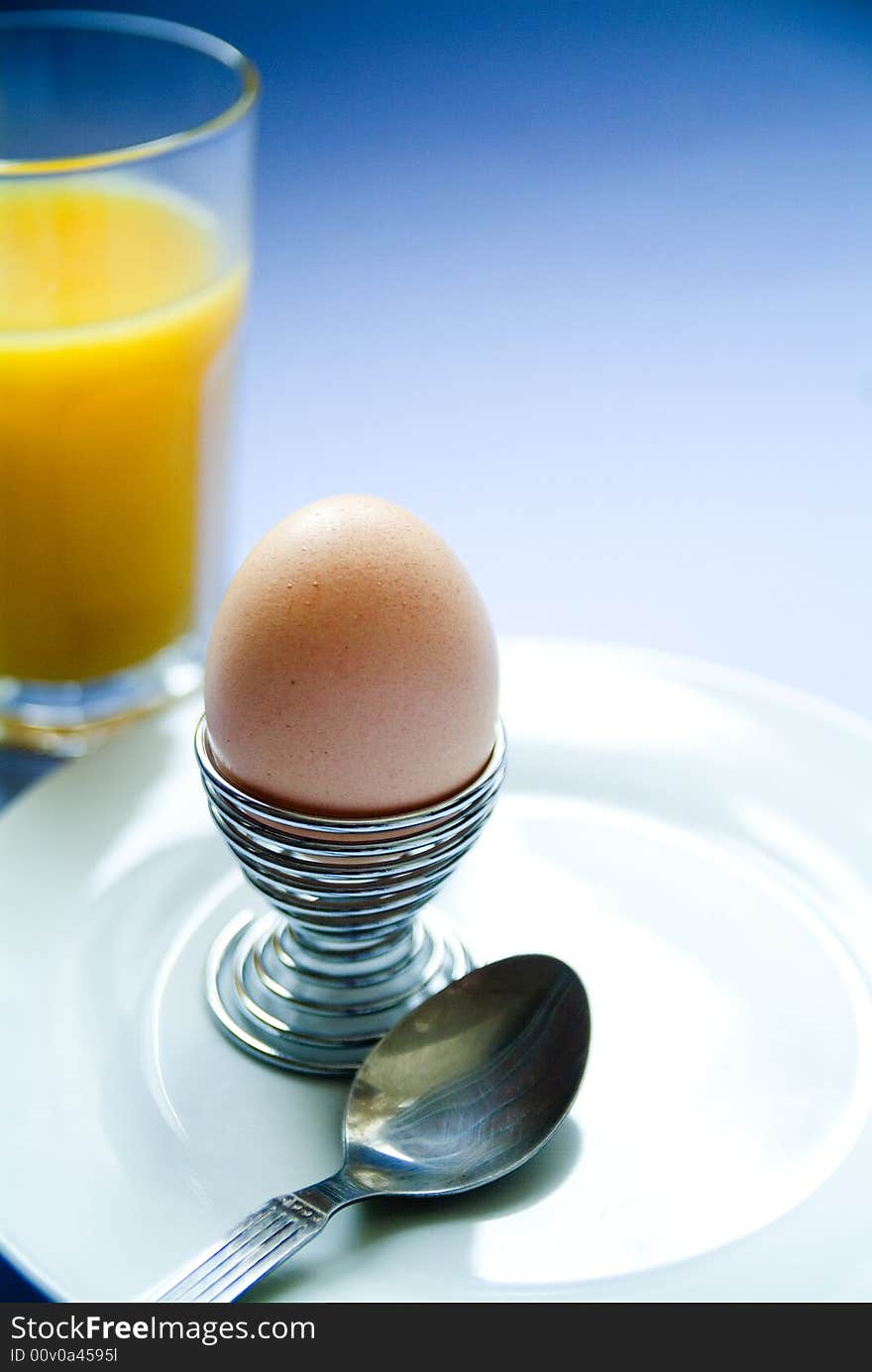 Boiled egg and orange juice