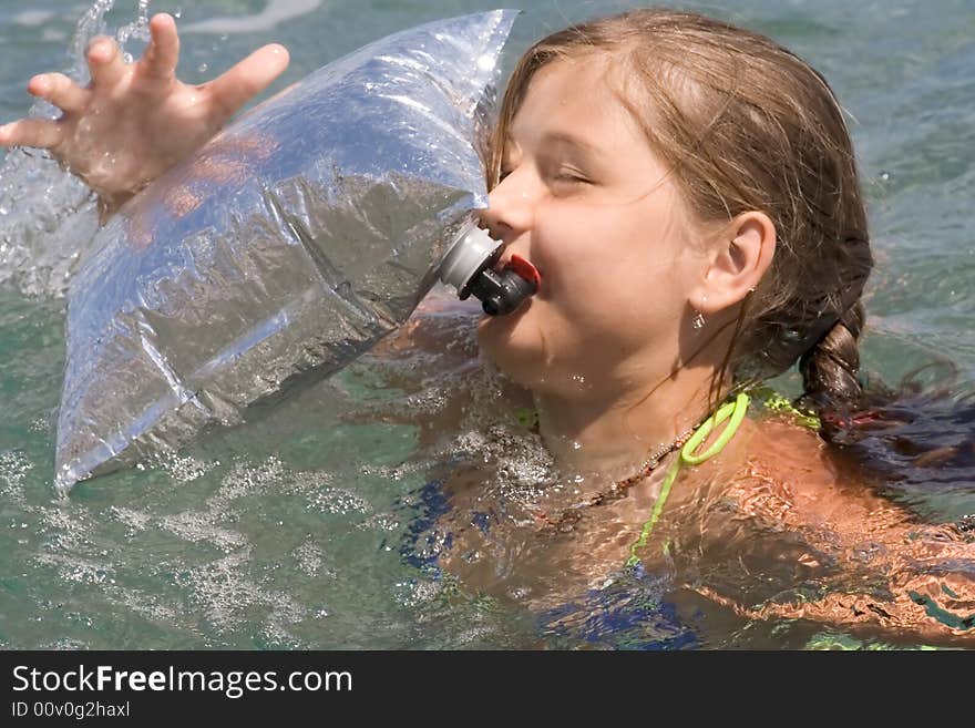 Teenager among waves in a sea (1)