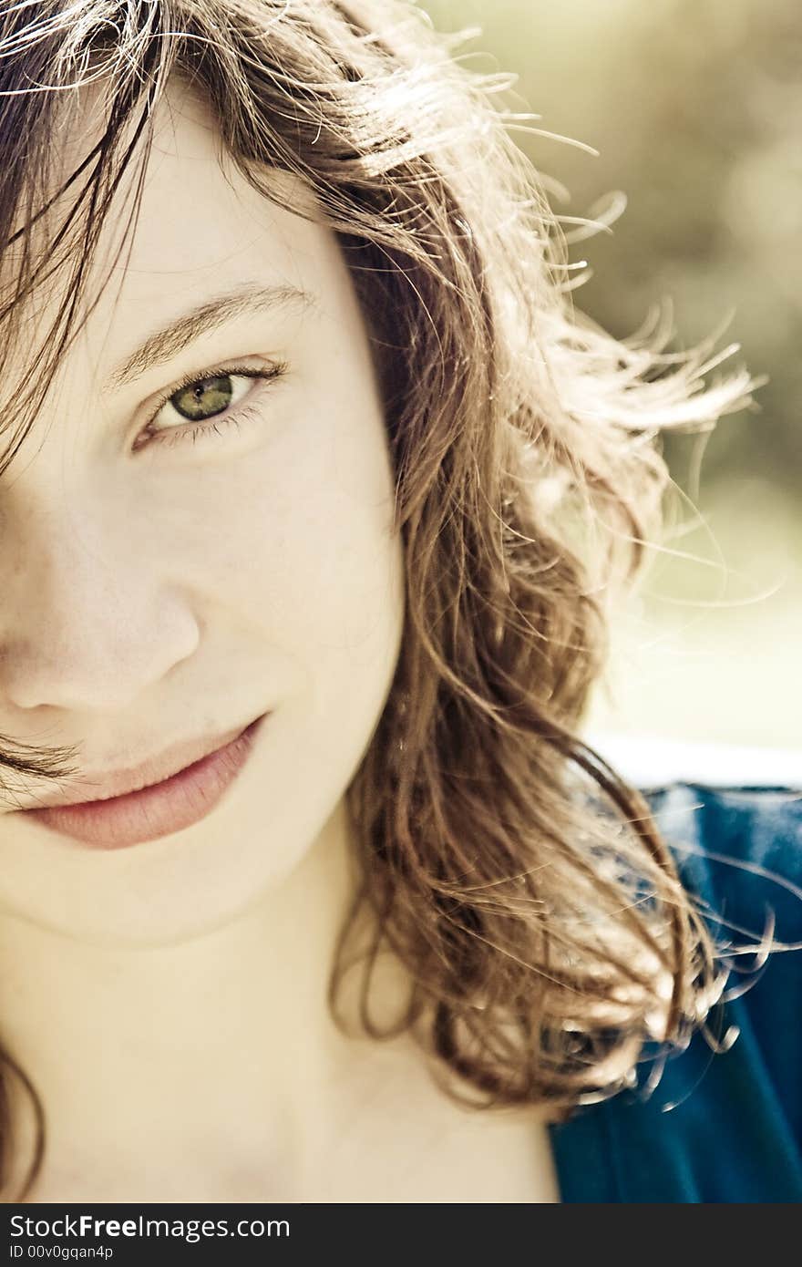 Close woman portrait with the world  reflected in her eyes.