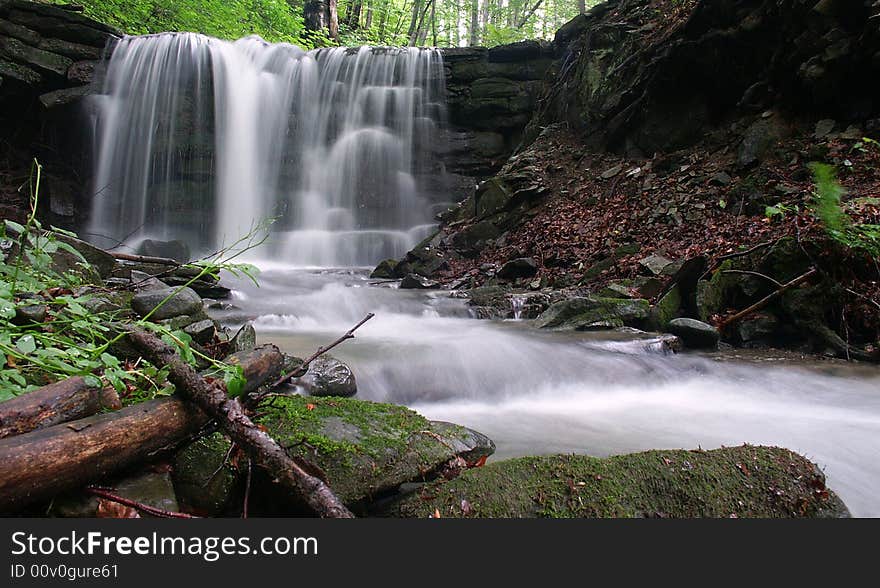 Photo of waterfall in the forest. Photo of waterfall in the forest