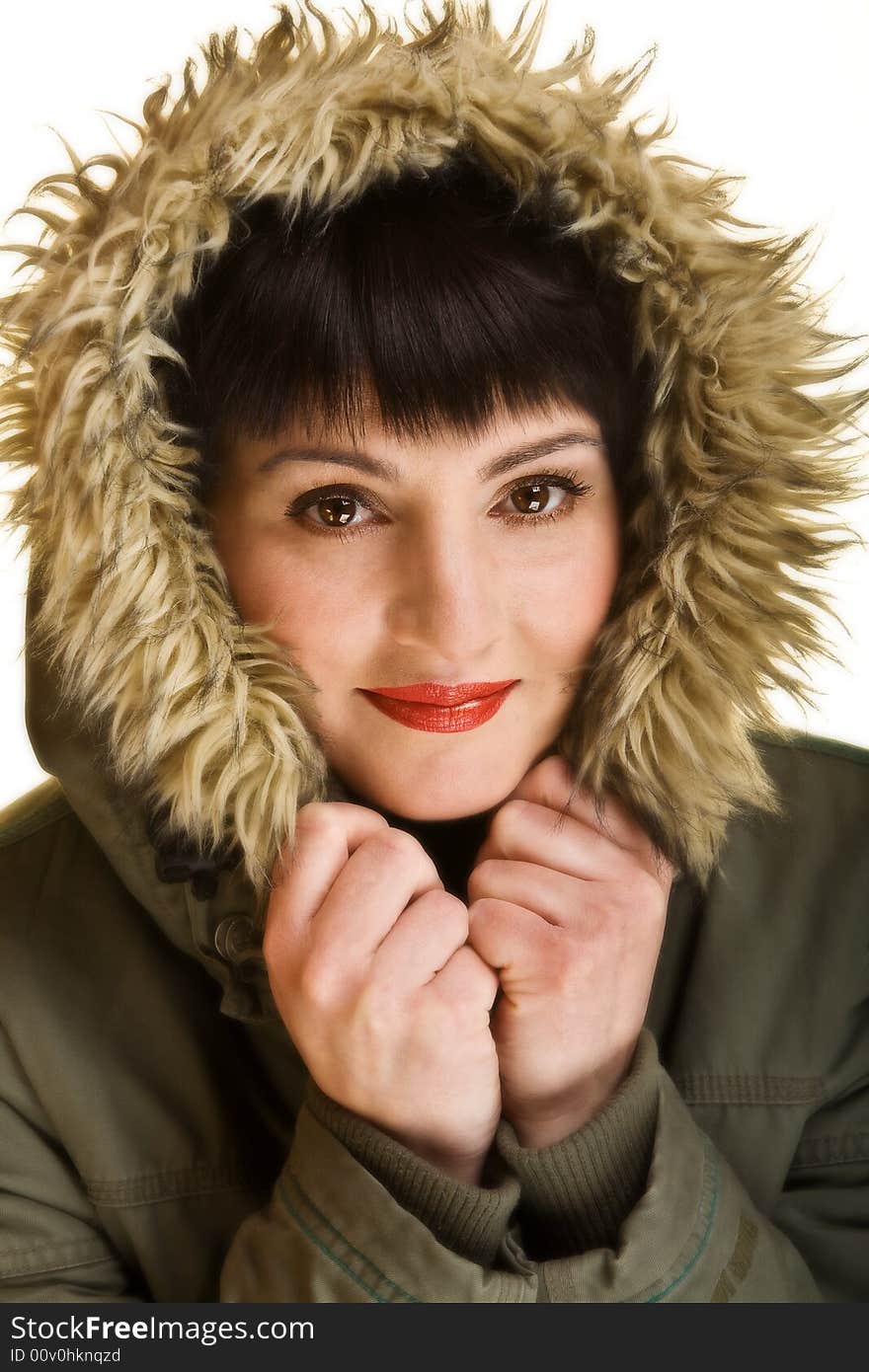 Close up of a woman with red lips wearing a nice warm winter jacket. Close up of a woman with red lips wearing a nice warm winter jacket.