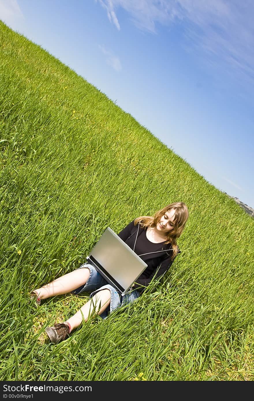 Woman Connected On The Grass