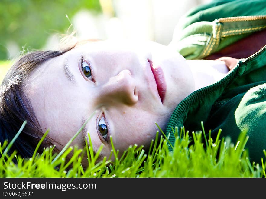 Young woman in the grass