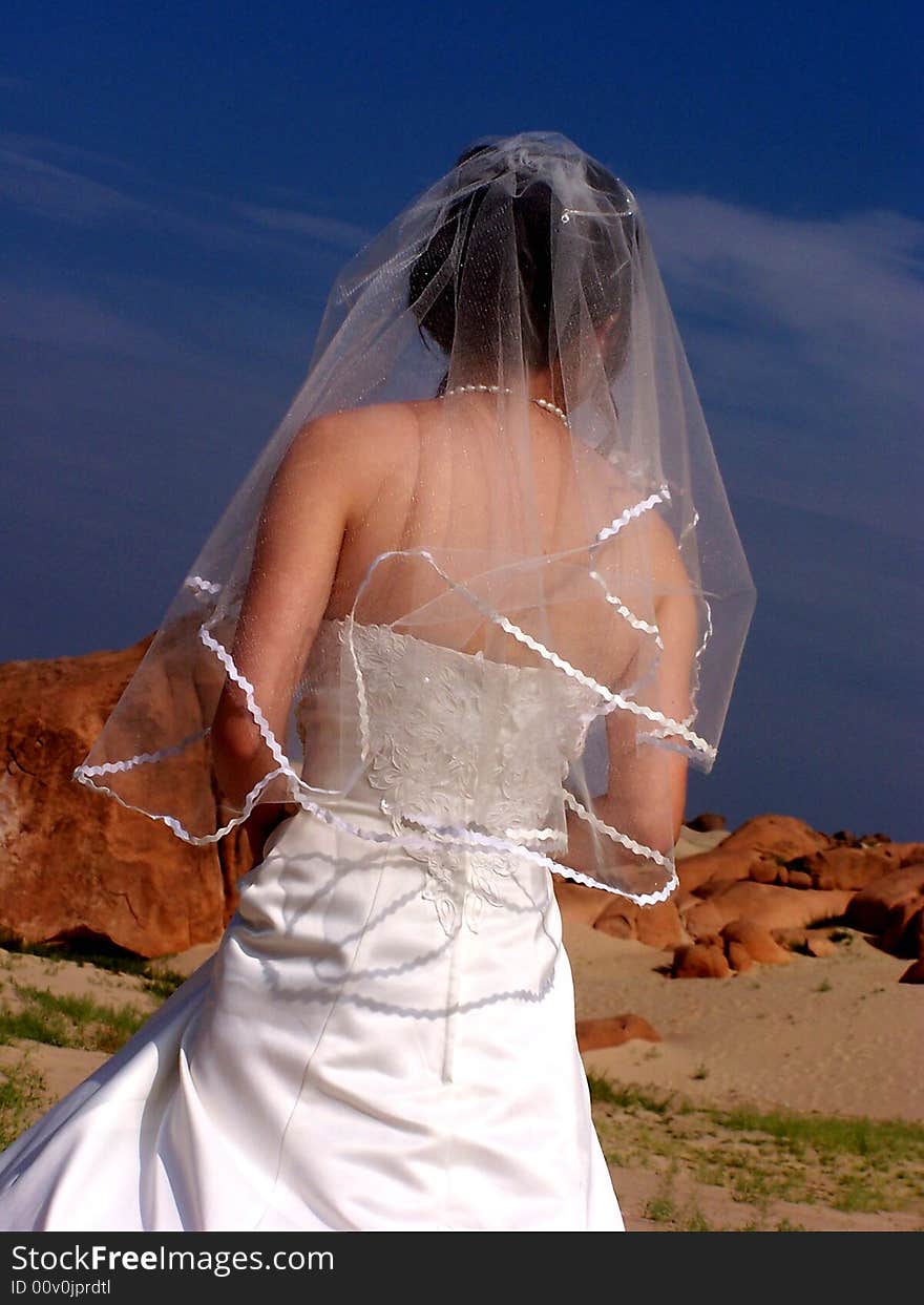 A young woman in wedding dress. A young woman in wedding dress