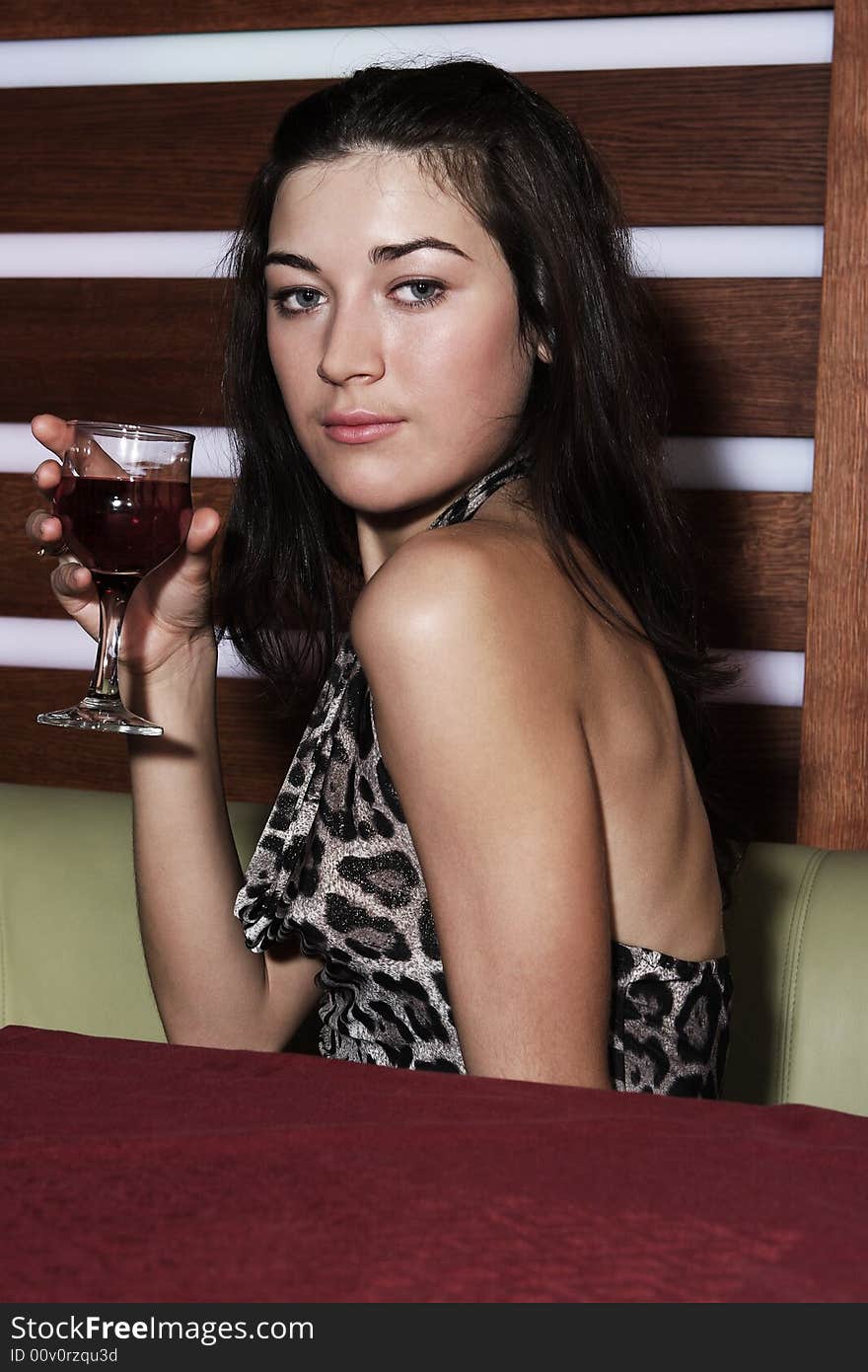 Girl with a glass of wine