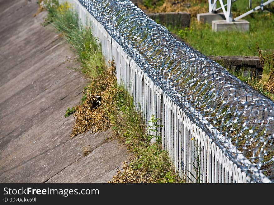 Security series: barbed wire on the fence