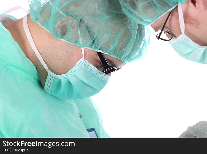 Details two surgeon at work on white background