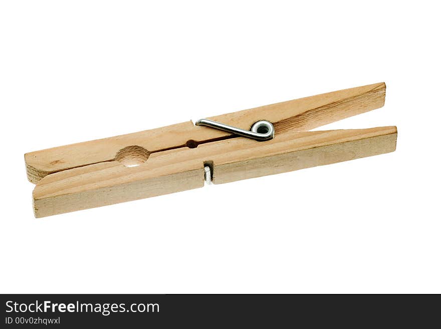 One isolated wooden clothespin (photo). One isolated wooden clothespin (photo)