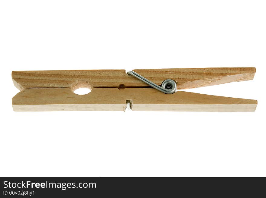 One isolated wooden clothespin (photo). One isolated wooden clothespin (photo)