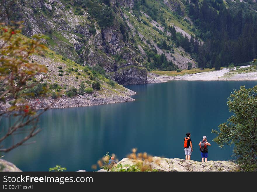 Trekkers watching the lake