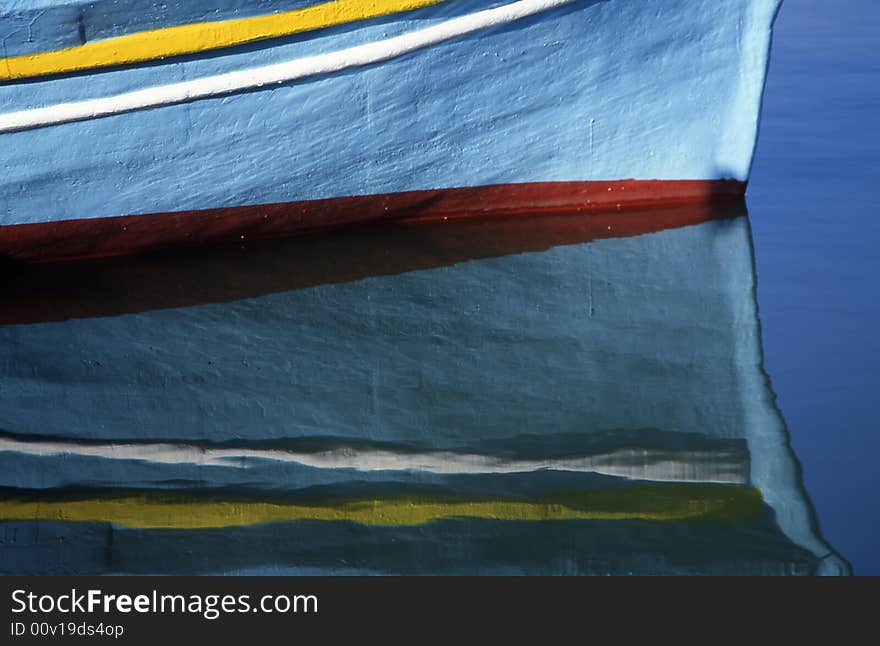 A reflection of a fish boat in a river. A reflection of a fish boat in a river