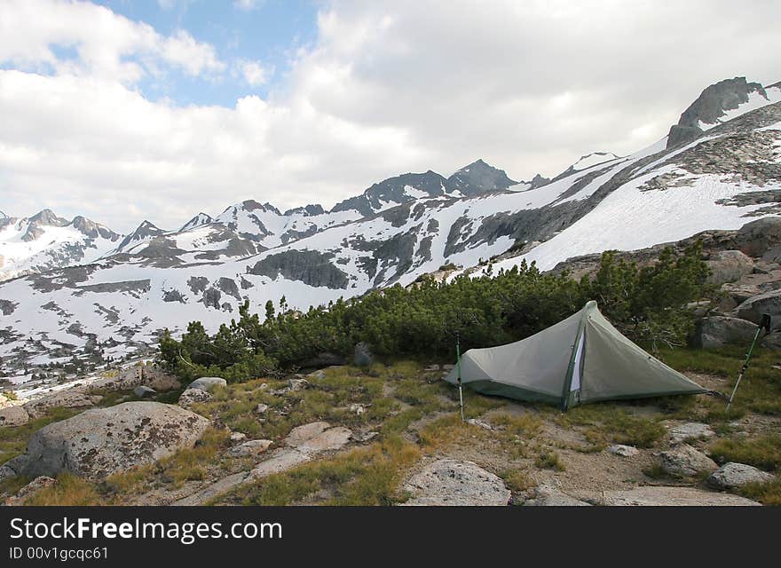 Hiker's camp in Sierra Nevada Mountains, along the John Muir Trail, near Donahue Pass, Yosemite National Park. Hiker's camp in Sierra Nevada Mountains, along the John Muir Trail, near Donahue Pass, Yosemite National Park.