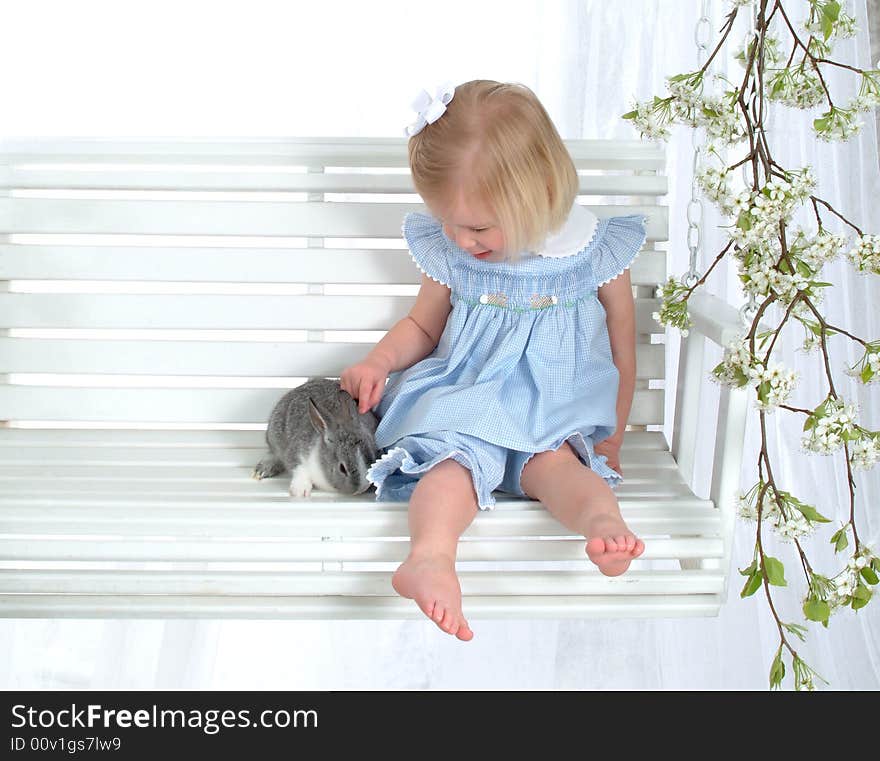 Girl and Bunny on Swing