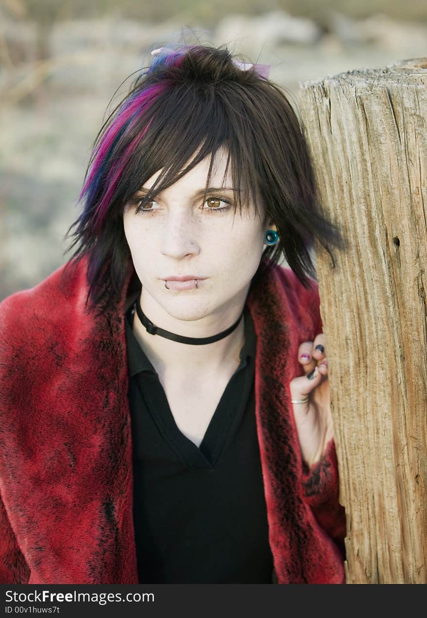 Young Girl with A Magenta Streak in her Hair