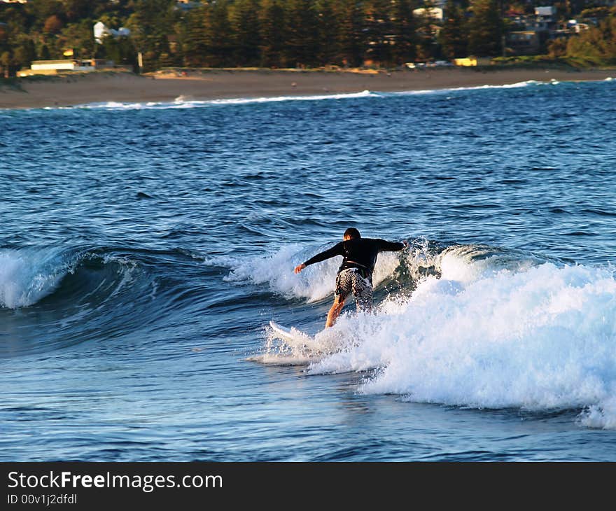 Boy surfing in Australian coast. Boy surfing in Australian coast