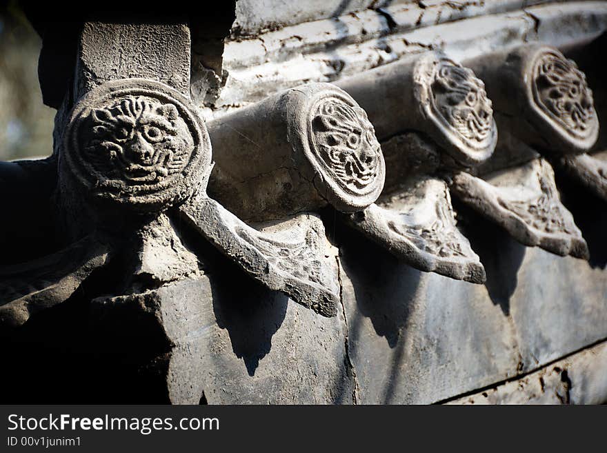 the tiles with pattern from the eaves of Chinese buildings