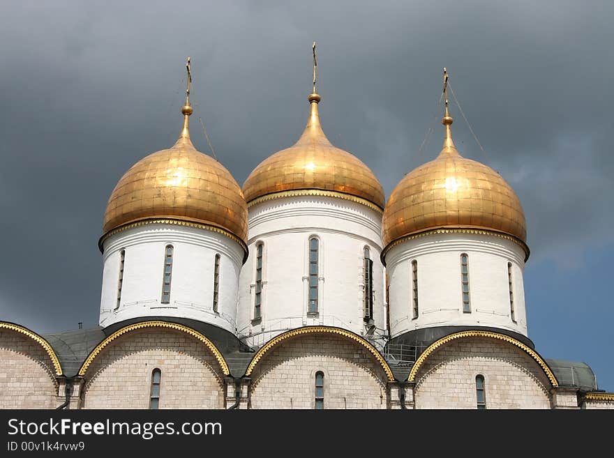 Golden domes of a church in the Kremlin, Moscow. Golden domes of a church in the Kremlin, Moscow