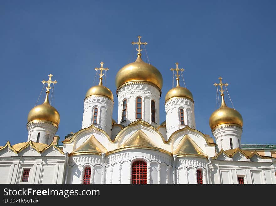 Golden domes of a church in the Kremlin, Moscow. Golden domes of a church in the Kremlin, Moscow