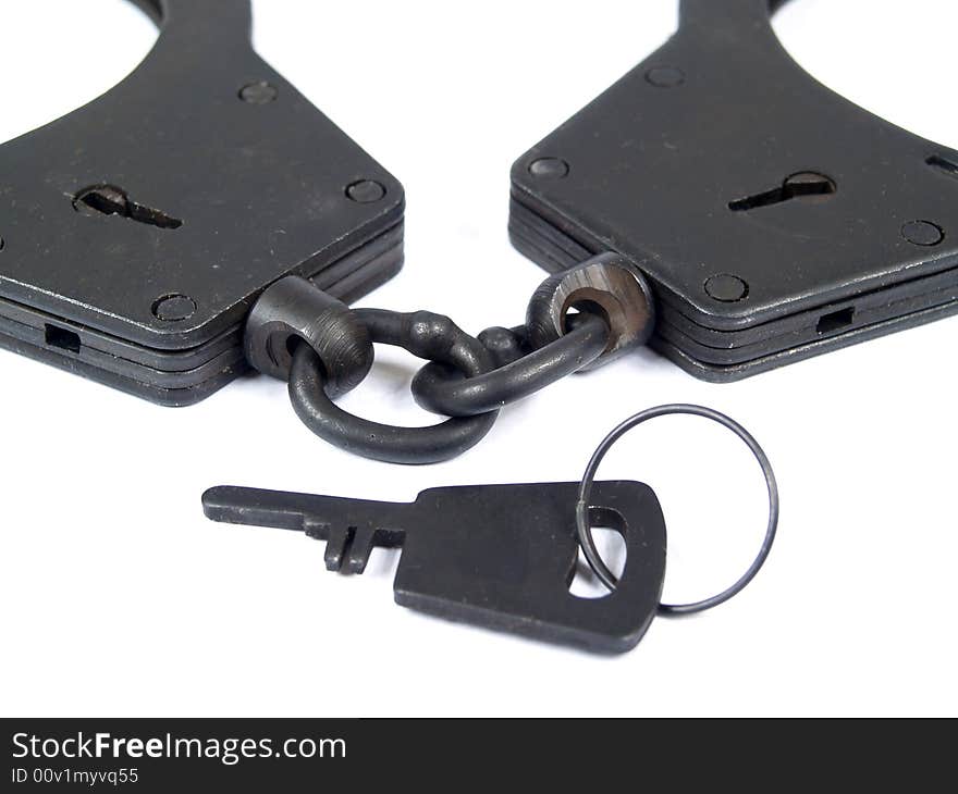 Black manacles on white background. Black manacles on white background