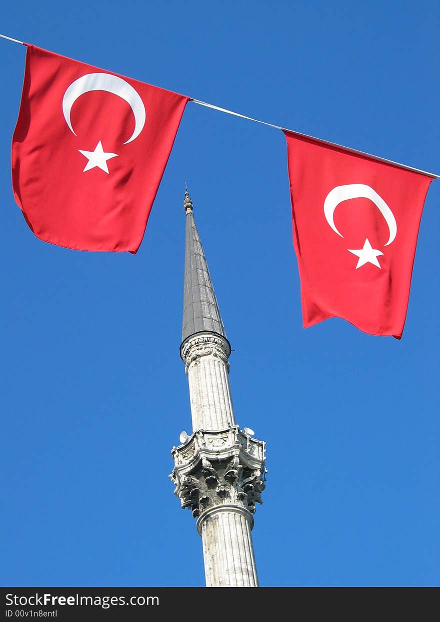 Turkish flag and a minaret in Istanbul