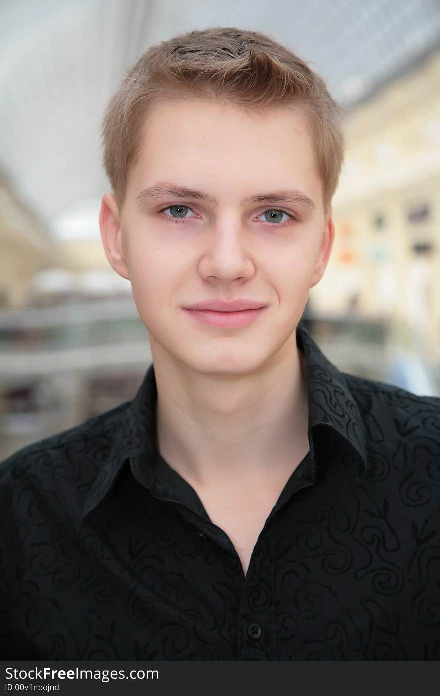 Young man in black shirt indoor