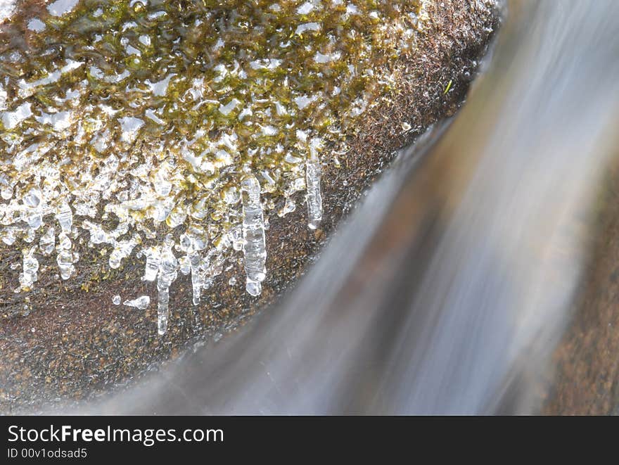 River icicles capture the sunlight in Yosemite National park during winter months. River icicles capture the sunlight in Yosemite National park during winter months