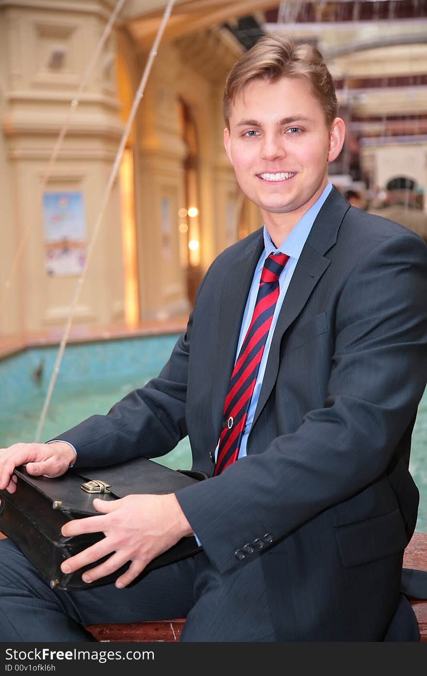 Young businessman with briefcase