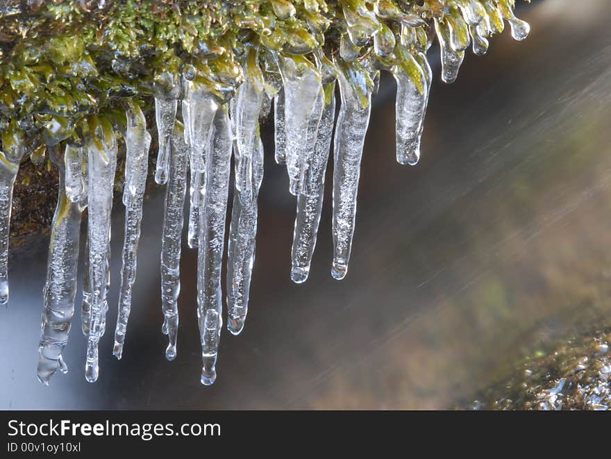 River icicles capture the sunlight in Yosemite National park during winter months. River icicles capture the sunlight in Yosemite National park during winter months