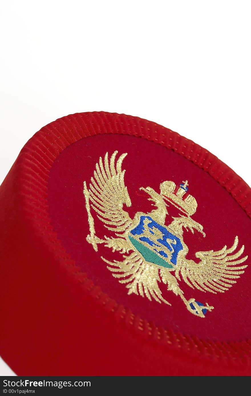 Traditional red montenegrin cap on white background. Traditional red montenegrin cap on white background