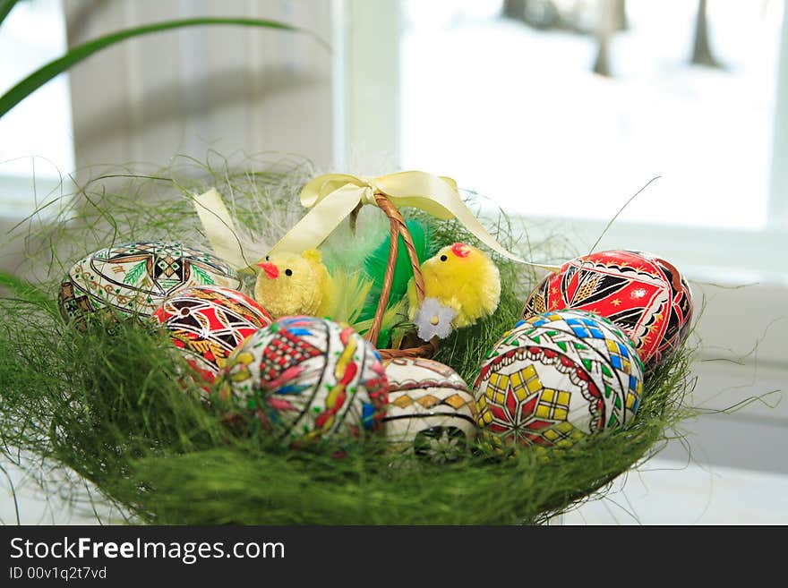 Hand painted Easter eggs in basket