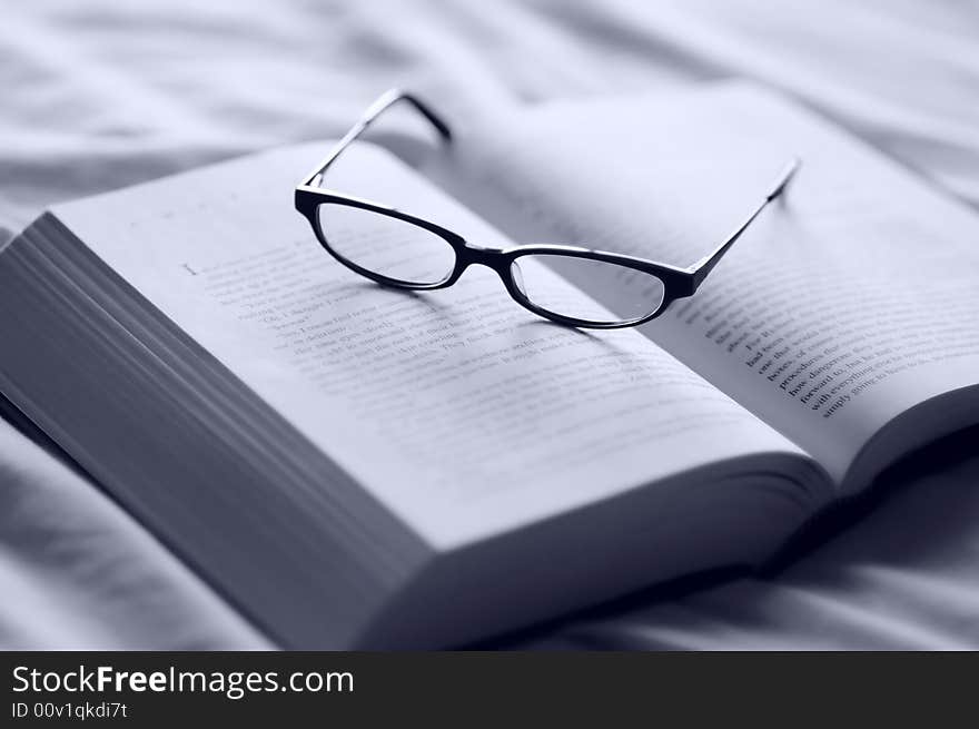 Glasses on book