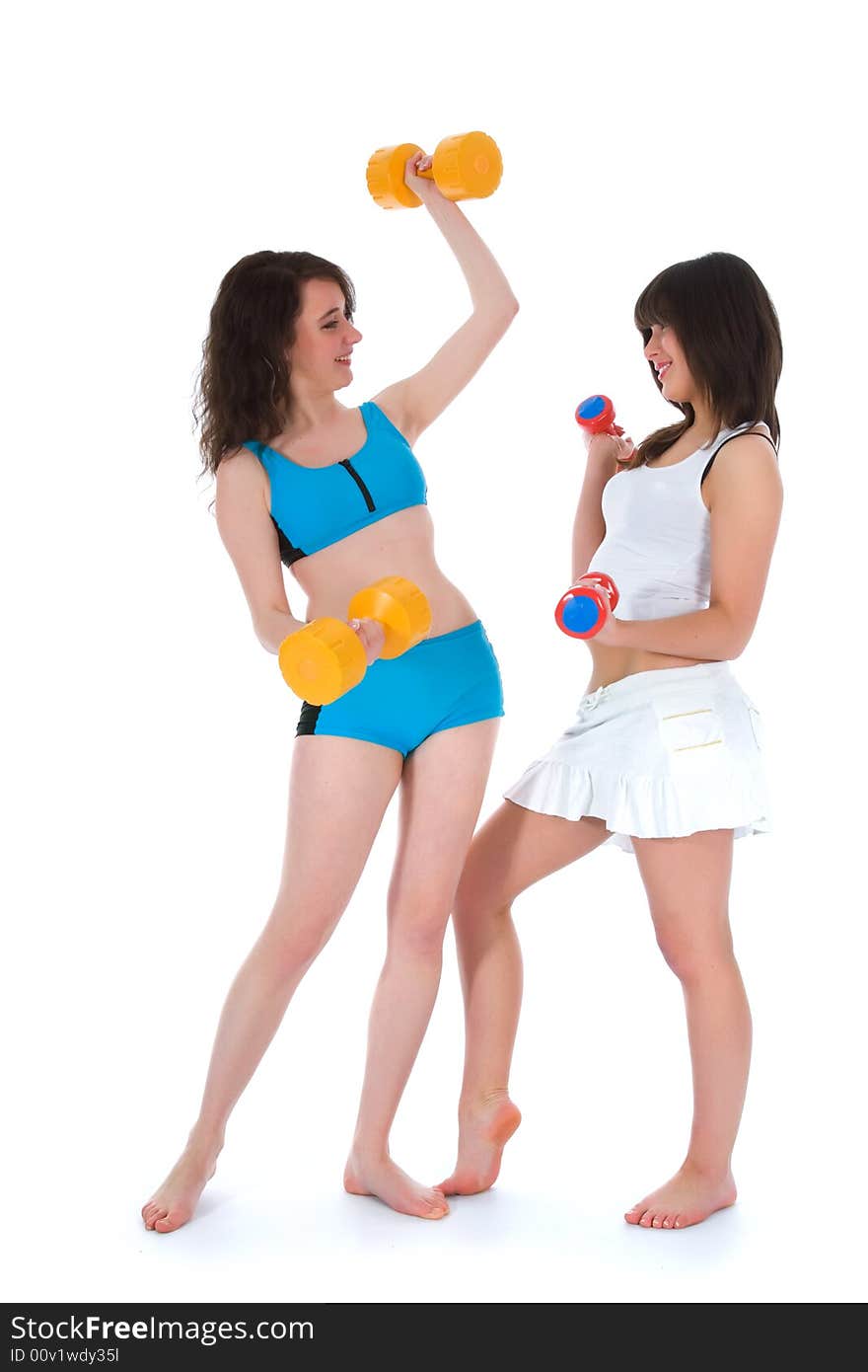 Girls practicing fitness on white background