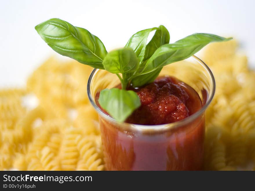 Fusilli pasta with tomato sauce and basil. Fusilli pasta with tomato sauce and basil