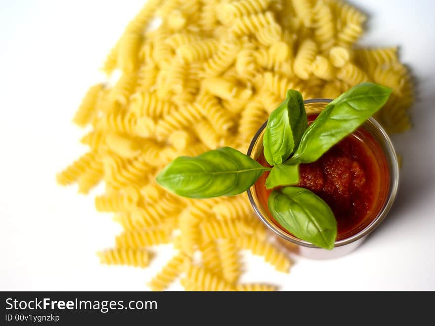 Fusilli pasta with tomato sauce and basil. Fusilli pasta with tomato sauce and basil