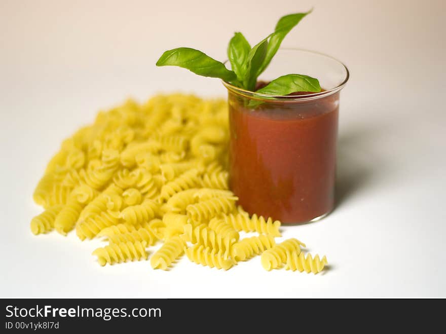 Fusilli pasta with tomato sauce and basil. Fusilli pasta with tomato sauce and basil