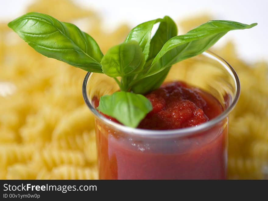 Fusilli pasta with tomato sauce and basil. Fusilli pasta with tomato sauce and basil