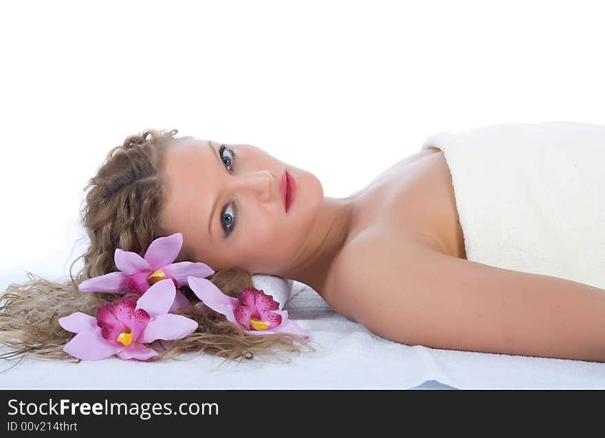 Attractive woman getting spa treatment on white