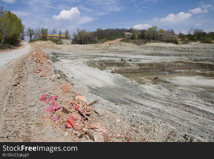 Huge opencast mine for digging the gault with the lake in the middle