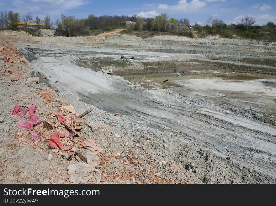 Huge opencast mine for digging the gault with the lake in the middle