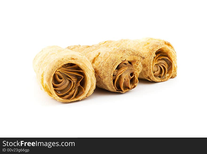 Isolated photo of fresh tubules filled with boiled condensed milk. Isolated photo of fresh tubules filled with boiled condensed milk