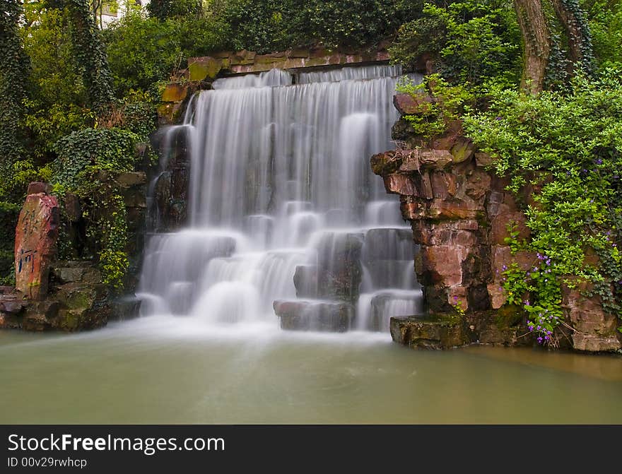 Waterfall of Yuantouzhu garden in spring. Waterfall of Yuantouzhu garden in spring