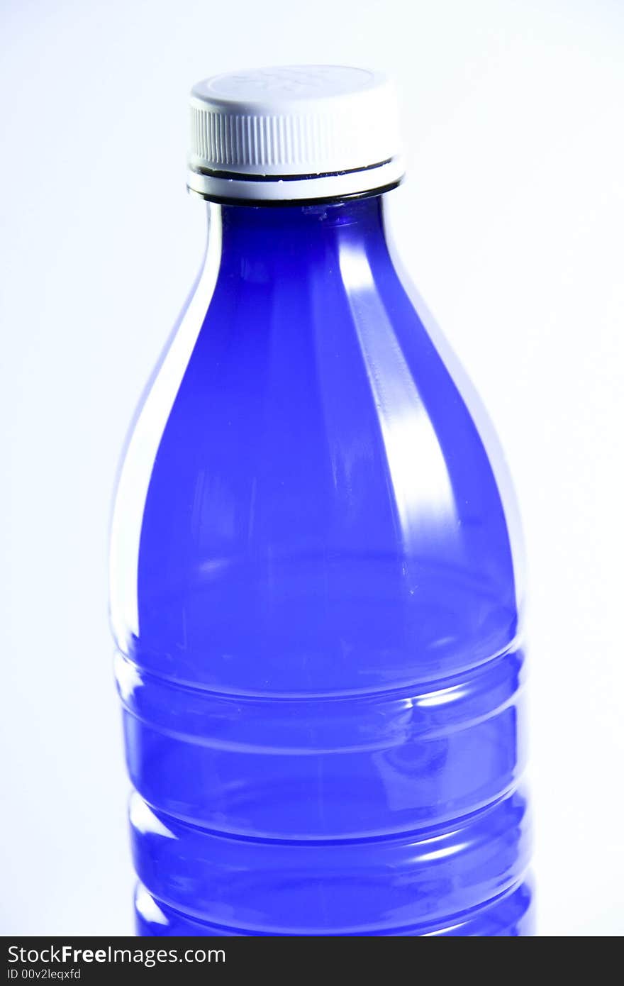 A blue bottle on a background