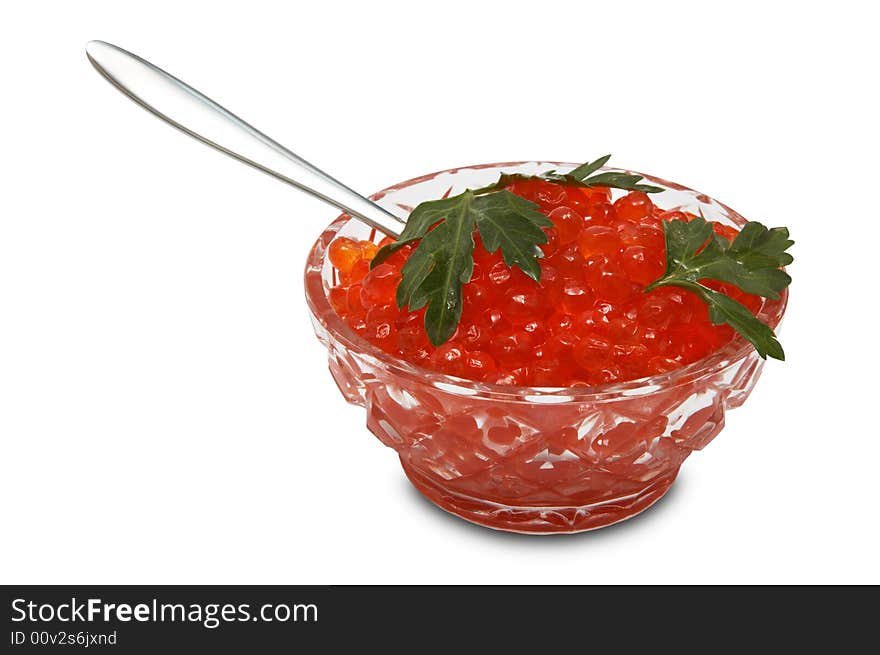 Crystal dish with red caviar on a white background