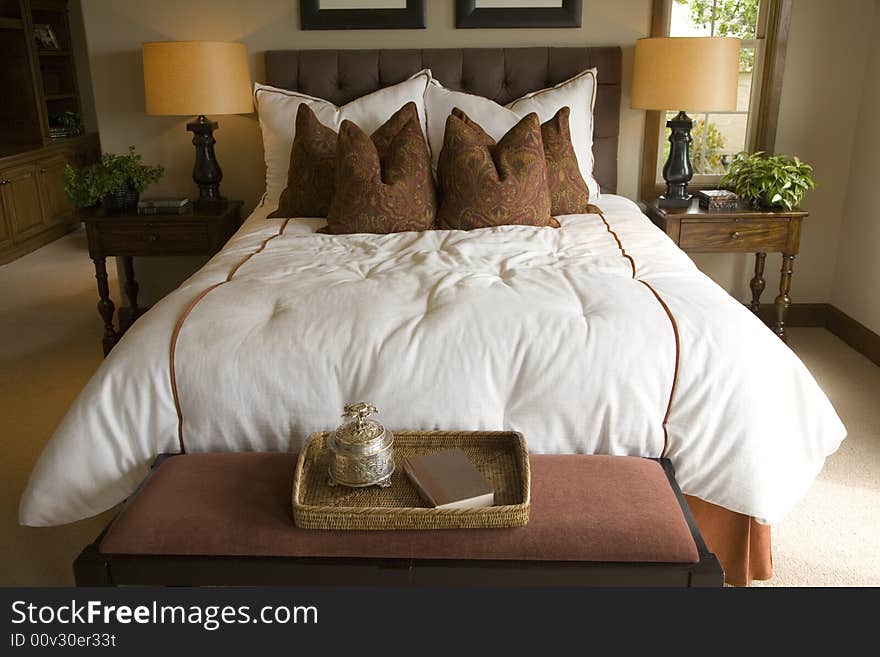 Luxury home bedroom with stylish furniture and decor. Luxury home bedroom with stylish furniture and decor.